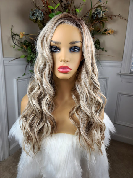 "Niki 22" - Lace front deep left partial monofilament (butter blonde)